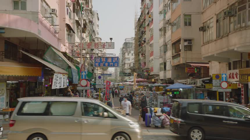 People walking on a street market on a boulevard in the city