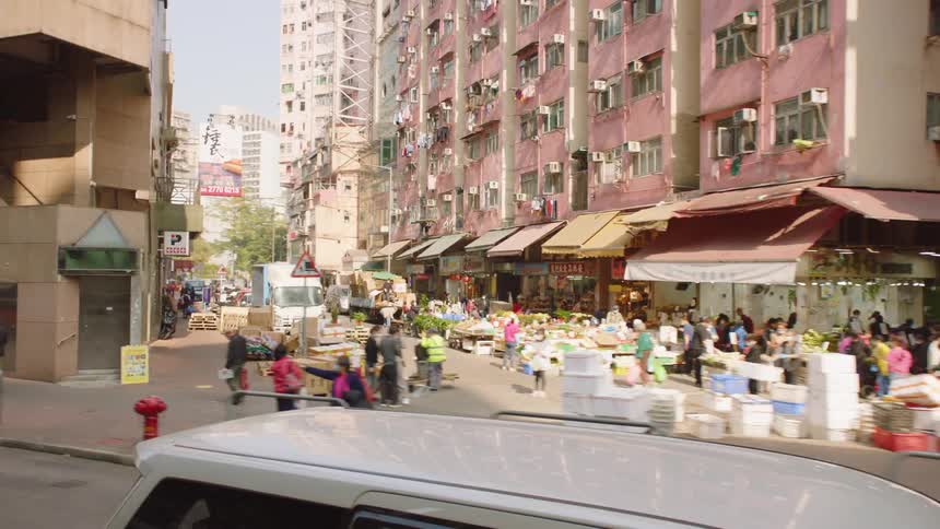 Pedestrians shop and walk in the city