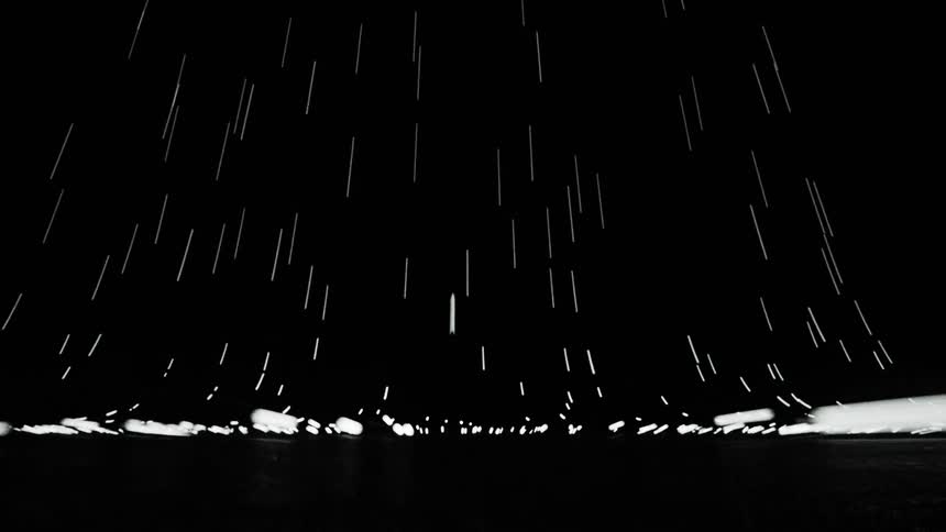 Abstract computer graphics of a woman figurine floating in to bright lights