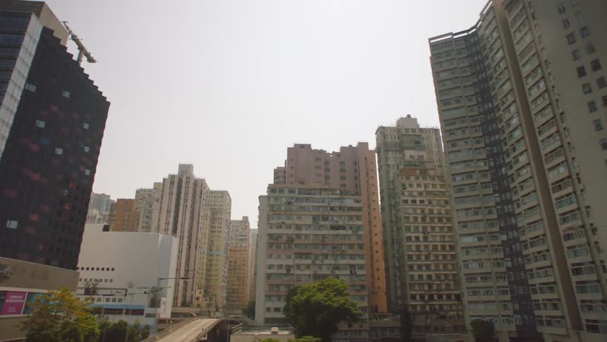 Modern skyscrapers sit along older skyscrapers in a city skyline