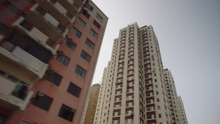 Large apartment buildings against the blue sky