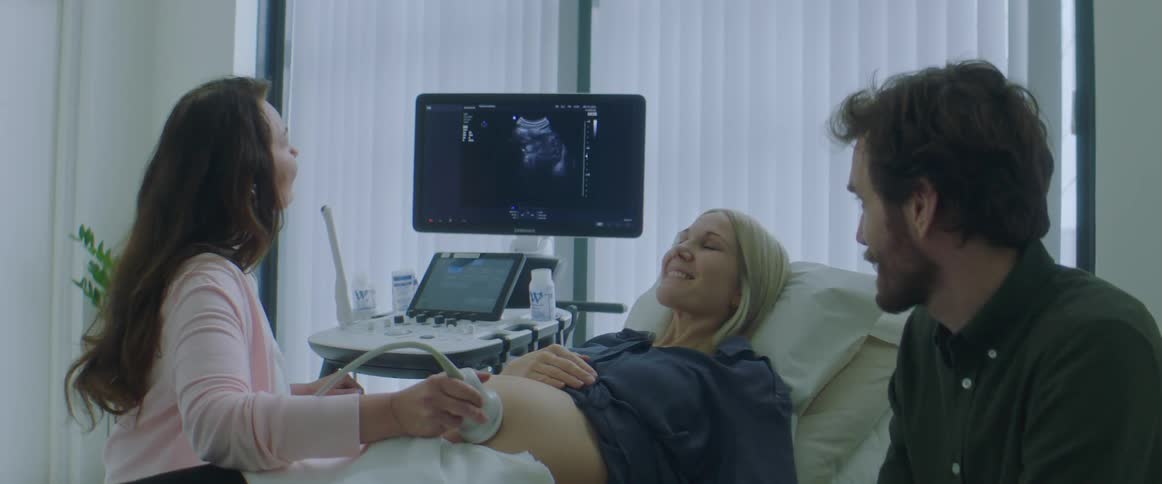 A woman is having a sonogram