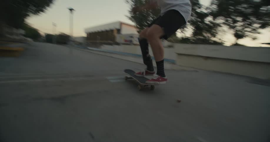 A skateboarder jumping down stairs