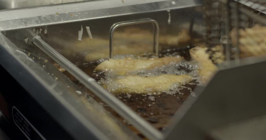Food is cooking in a deep fryer