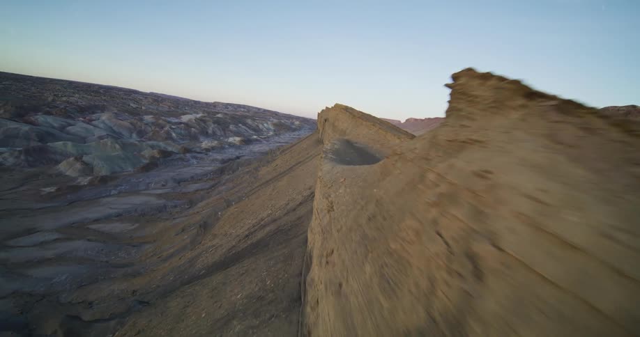 Horizontal cracks form on the peak of a canyon