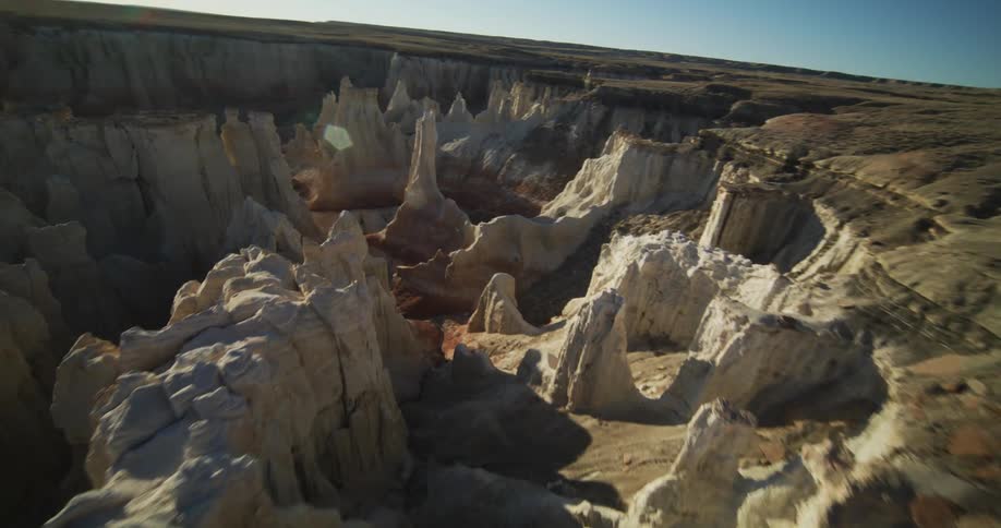 Aerial view of valley and canyons are displayed