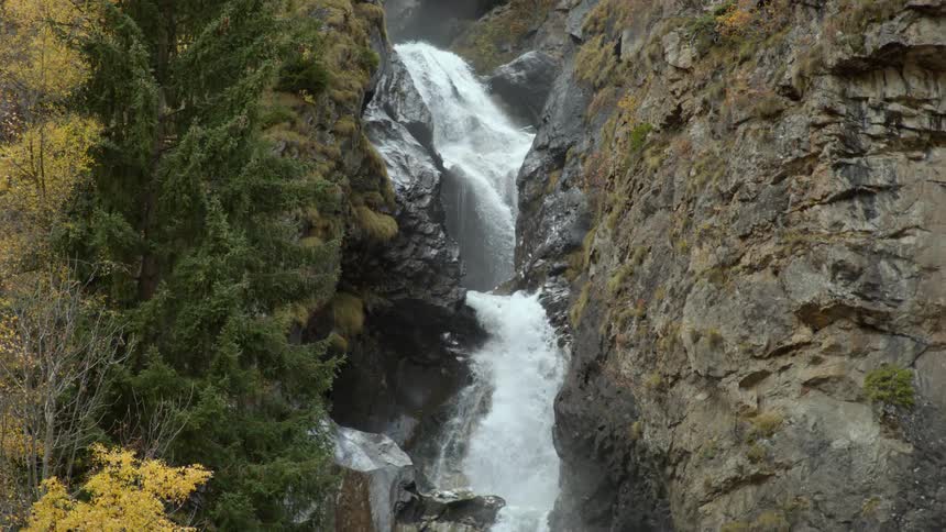 A view of a waterfall in a rocky area