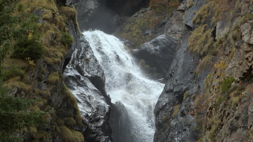 Water is flowing down a mountainous area