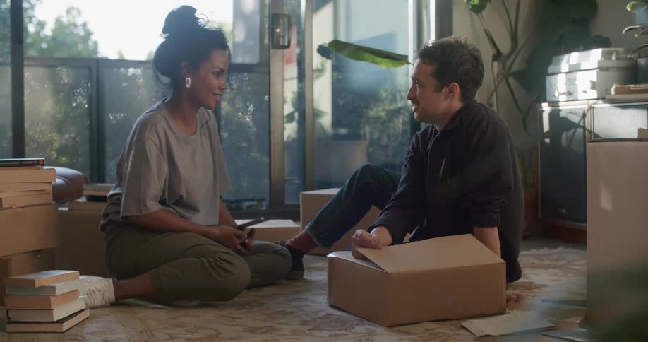 A man and woman talking with each other