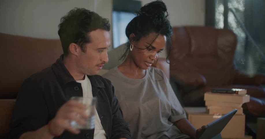 Man and woman using a computer together