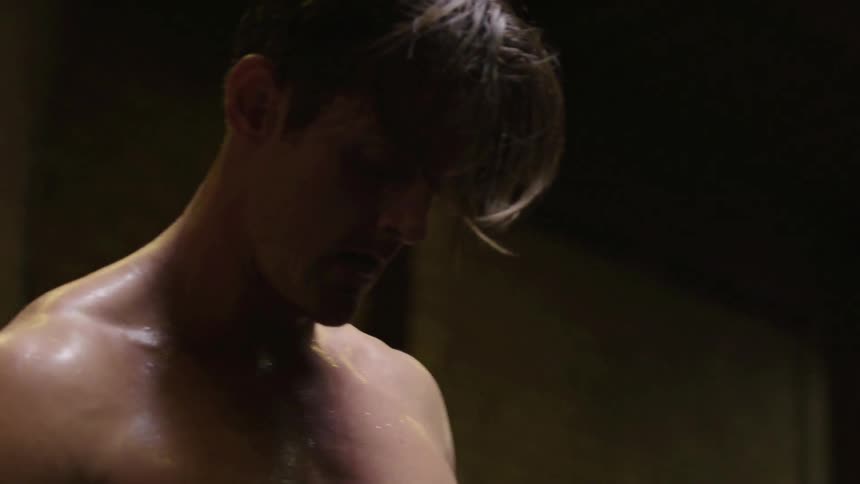 A man is sweating then he bends over