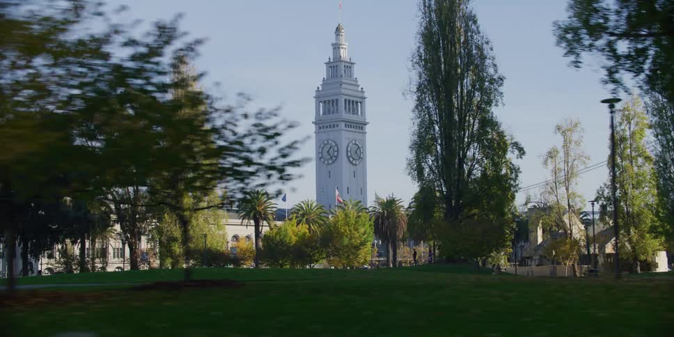 A person walks through the park in the city