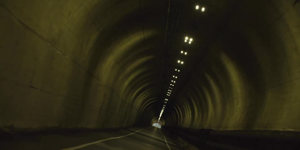 The tunnel is dark and long