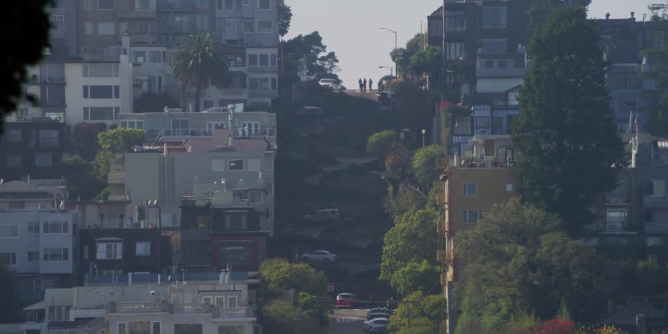 People walk and drive in the city