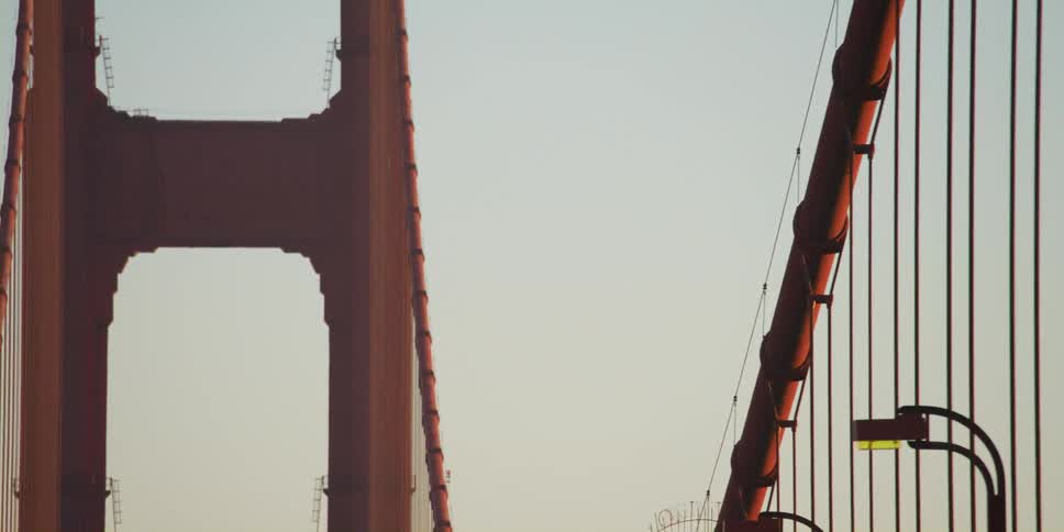 A car drives over the bridge
