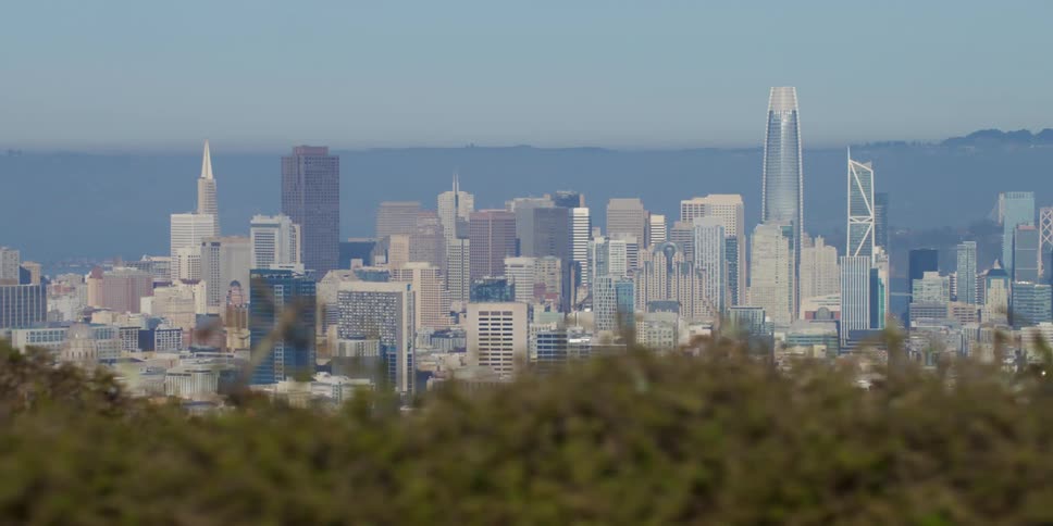Aerial view of a downtown skyline is displayed