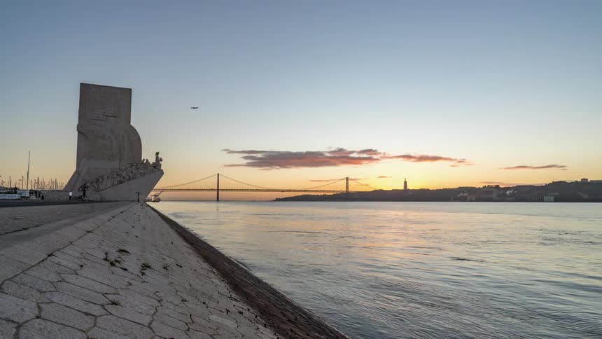 Time lapse view of a body of water at dusk is displayed