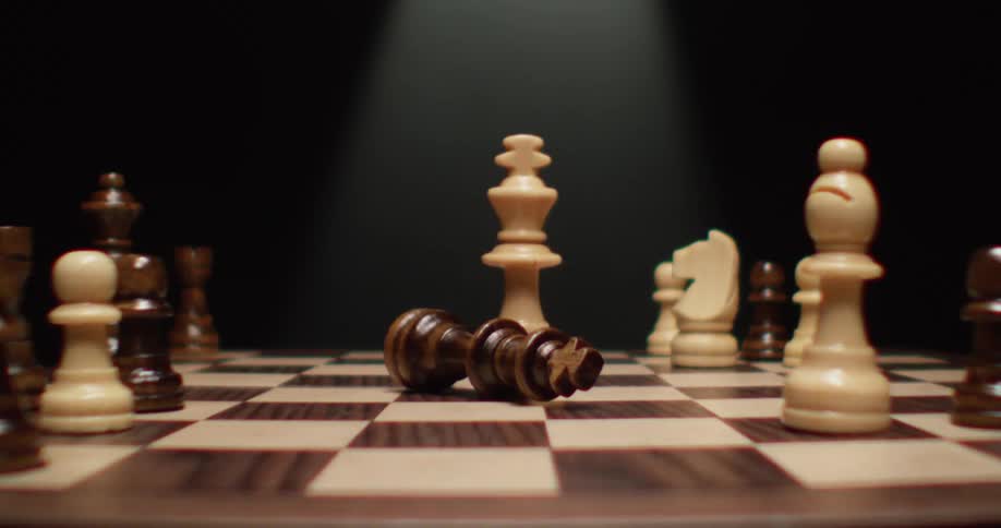 A chess piece is down on the board