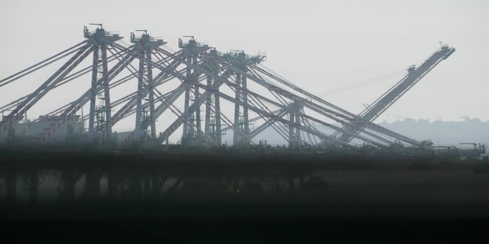 Ship sits near a construction area next to the lake