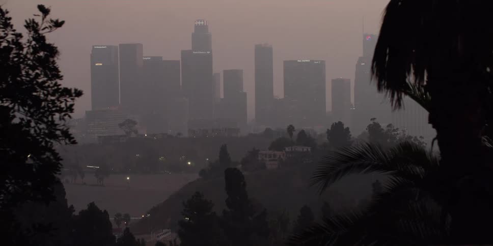 A view of a city with fog around it