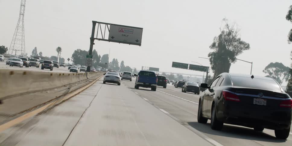 Vehicles driving down a freeway
