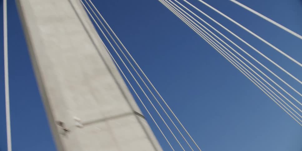 A view of a bridge with cables on it