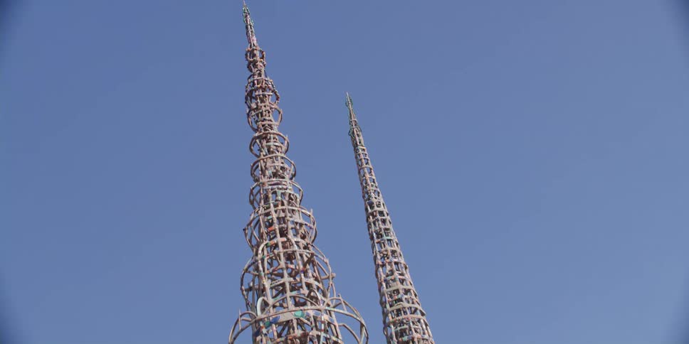 Spiral wrapped spires protrude off a building