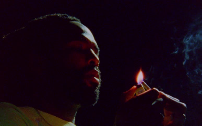 A man lights a cigarette