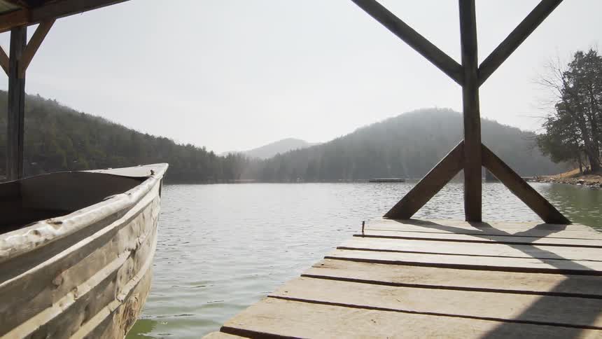 A boat anchored on a dock