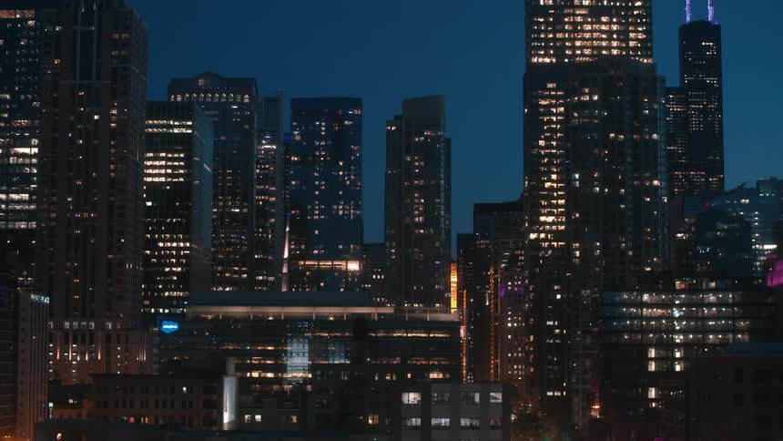Illuminated skyscrapers in the city at night