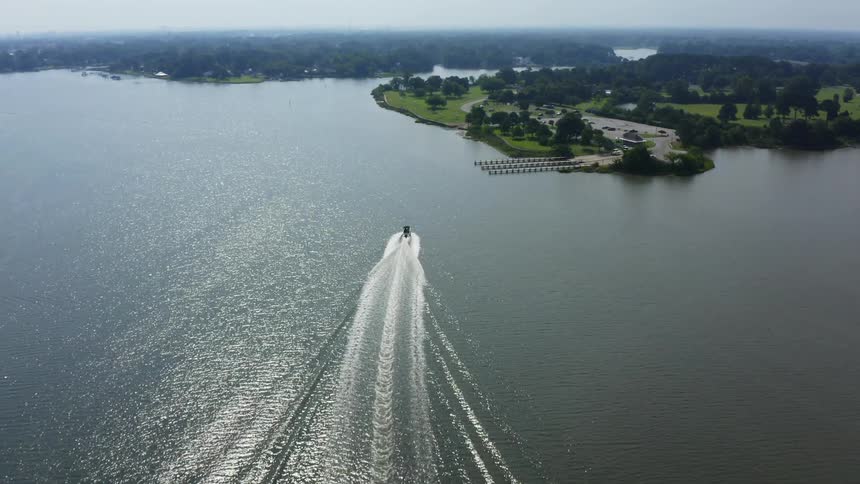 The boat is heading to the docks