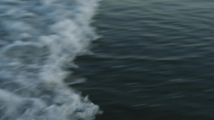 Waves roll into shore splashing
