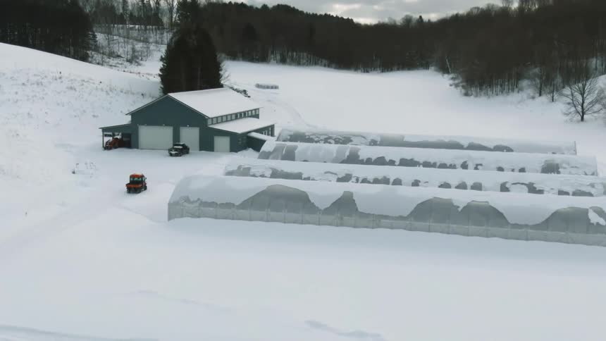 The farm is covered with snow