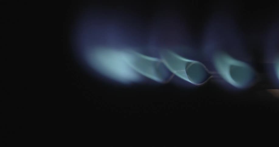 The flame of the stove top is on