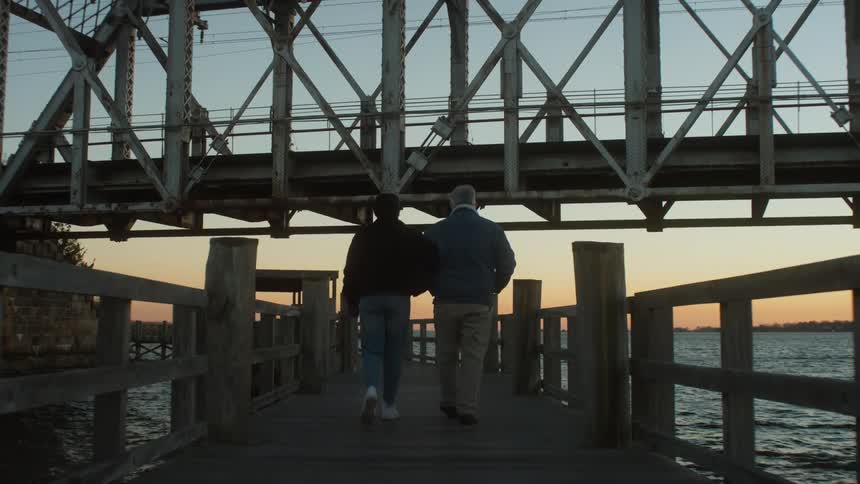 A view of two people walking outdoors