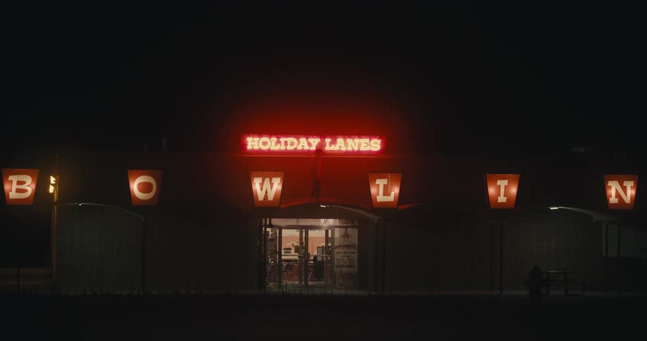 A view of a bowling alley from the outside