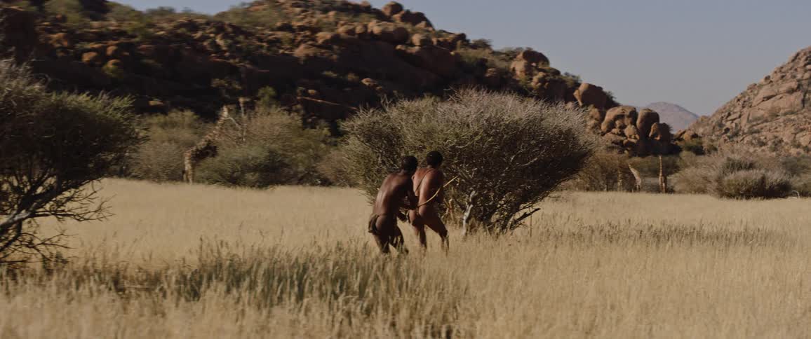 Tribal men stalking their prey