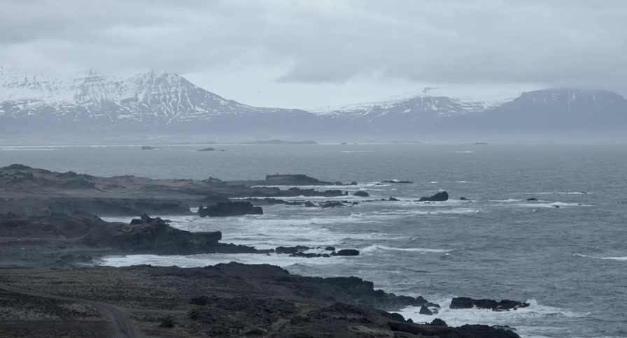 Cold ocean waters flowing into a rocky shore