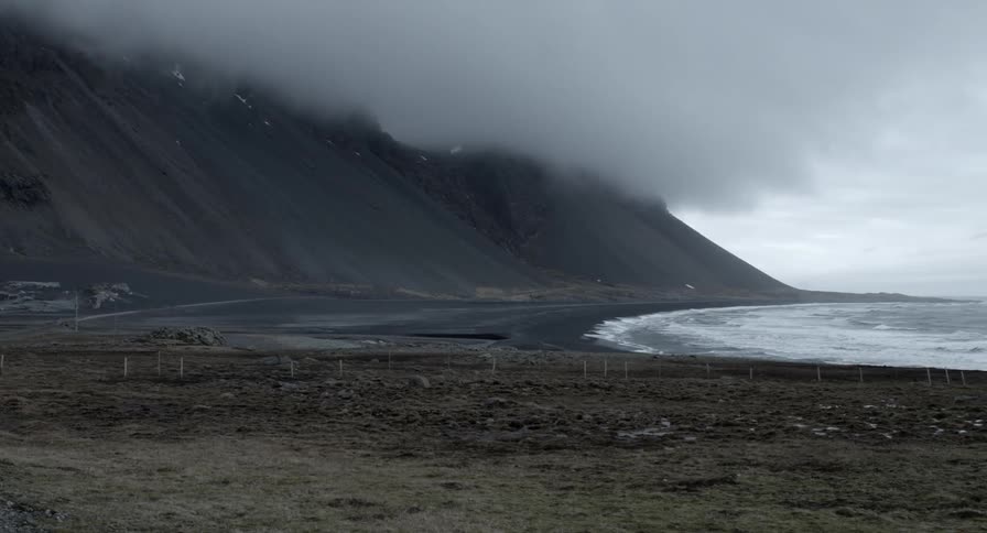 Thick fog clouds over a beach