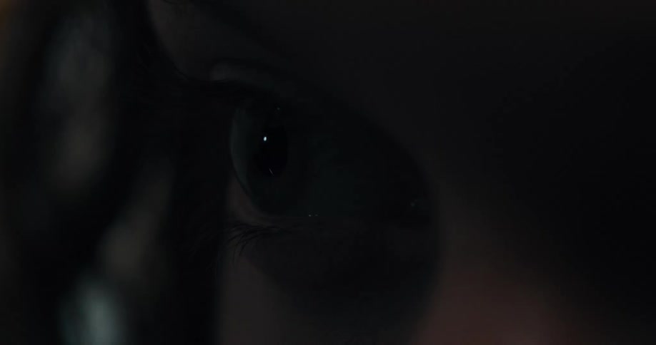 White persons eye blinking and looking ahead