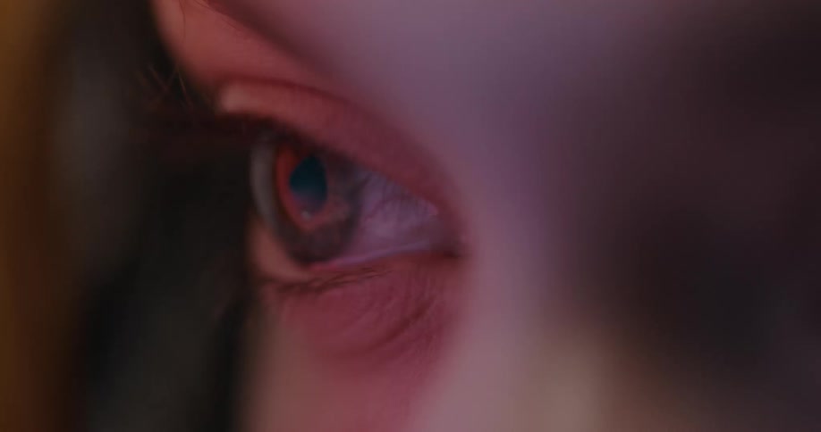A persons eye slowly blinks