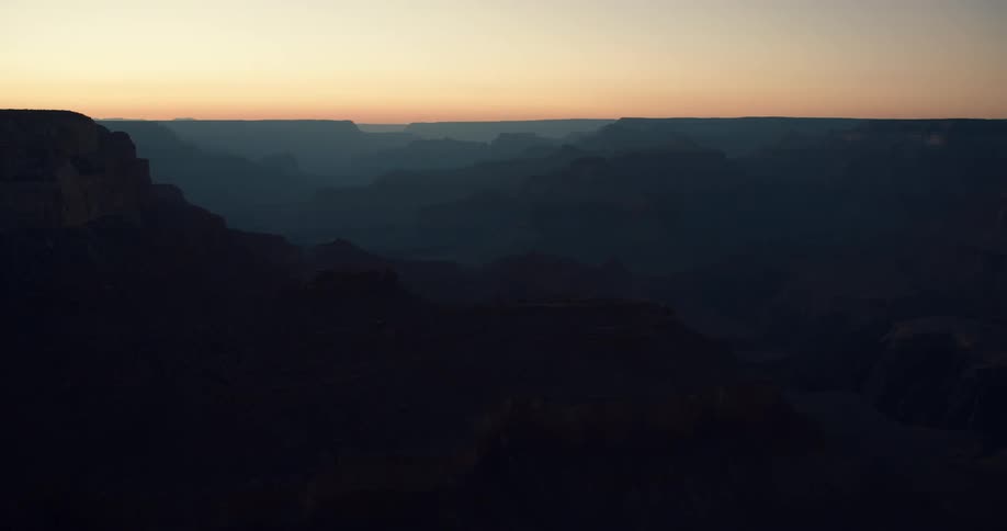 A vast canyon at sunrise