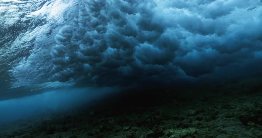 Wave breaking over coral reef underwater