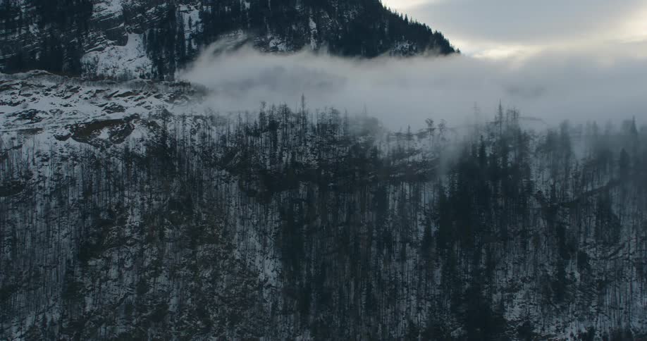 Fog covers the mountain top