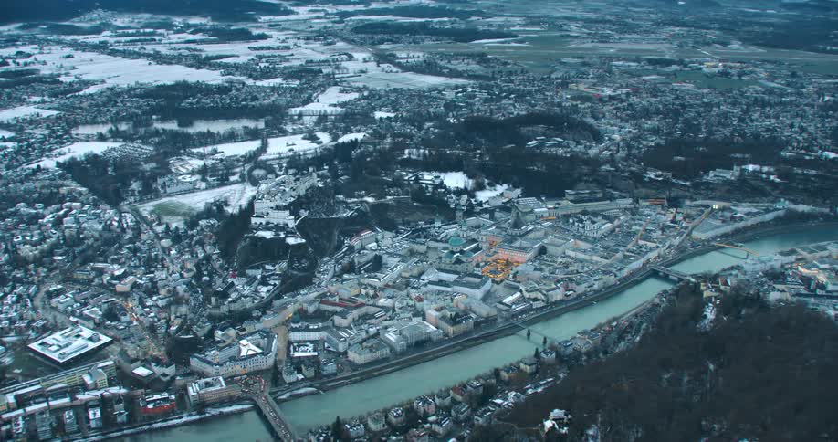 A river runs through a dense suburb