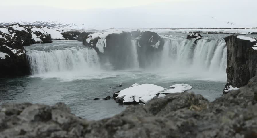 Godafoss waterfall in Iceland in snowy scenery