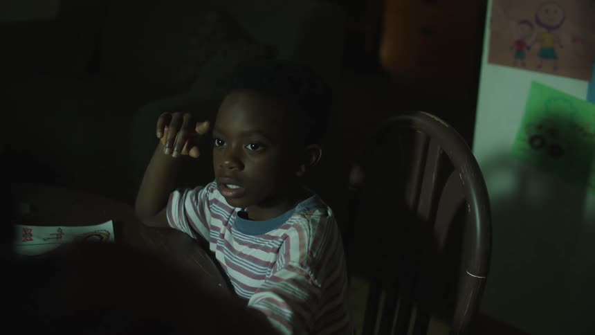 A child sitting at a table