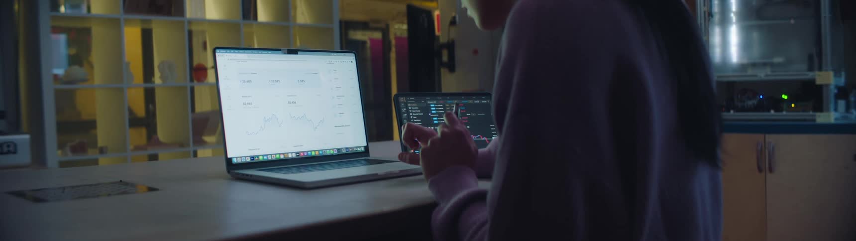 A woman is using her laptop