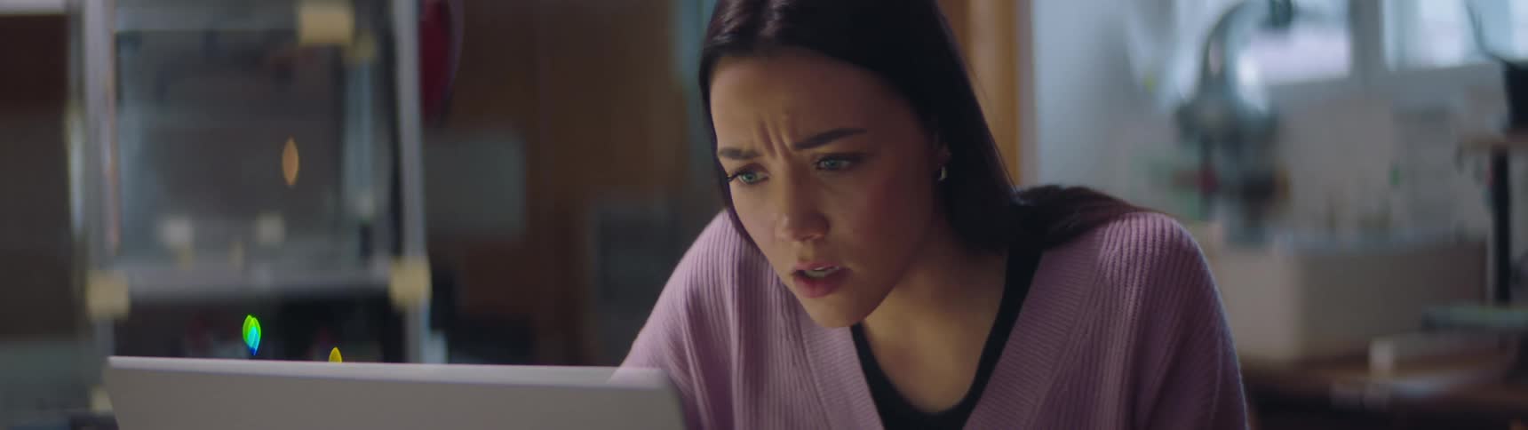 Woman is confused while trying to solve a problem with her study partner