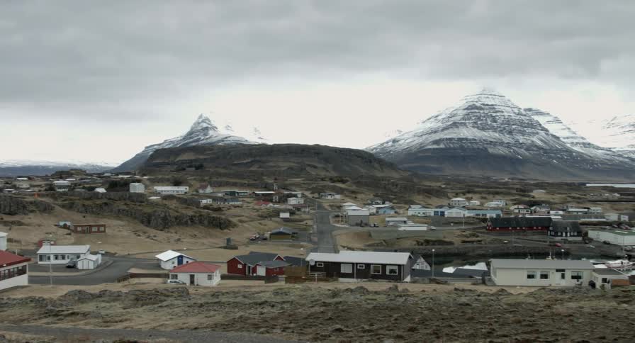 Businesses and houses of a small town near the water